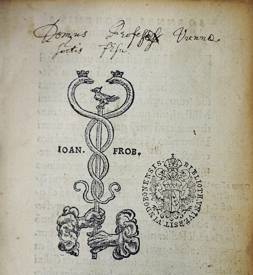 Printer’s mark of Johann Froben, two hands holding a staff with a bird on top, with two crowned snakes to the left and right